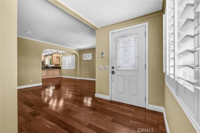 3163 La Clede Ave, Los Angeles, CA 90039 - entrance foyer with a chandelier, arched walkways, hardwood / wood-style flooring, baseboards, and ornamental molding