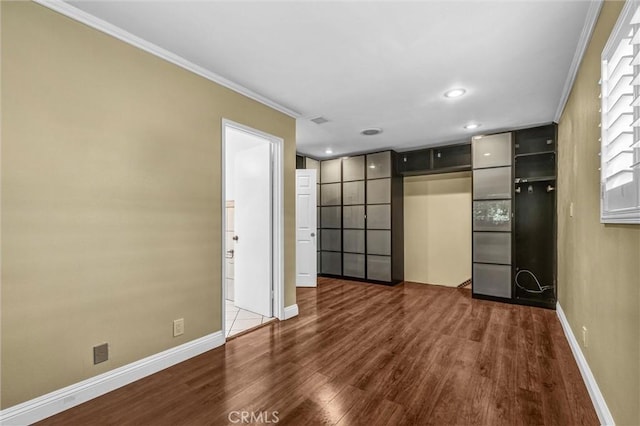 3163 La Clede Ave, Los Angeles, CA 90039 - unfurnished bedroom featuring wood finished floors, crown molding, baseboards, and recessed lighting
