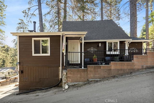 22864 Alder Ln, Crestline, CA 92325 - view of front of house with a porch