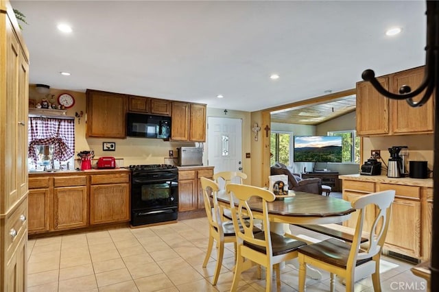 22864 Alder Ln, Crestline, CA 92325 - kitchen with black appliances, light tile patterned flooring, recessed lighting, and brown cabinetry