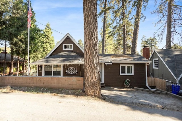 22864 Alder Ln, Crestline, CA 92325 - view of front of property with a chimney