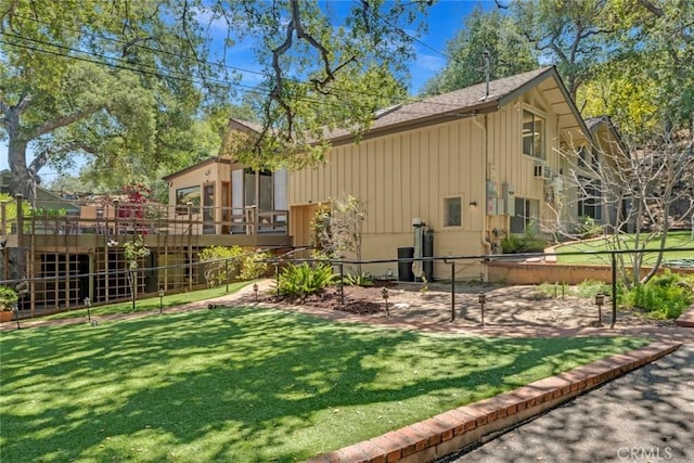 8402 Mcgroarty St, Sunland, CA 91040 - rear view of property featuring board and batten siding and a wooden deck