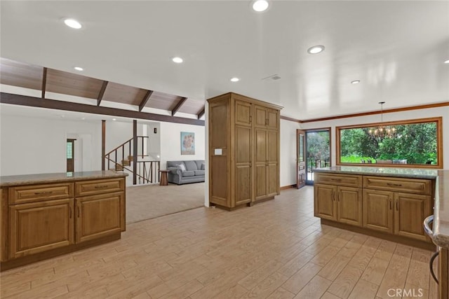 8402 Mcgroarty St, Sunland, CA 91040 - kitchen with plenty of natural light, a chandelier, brown cabinetry, light wood-type flooring, and recessed lighting