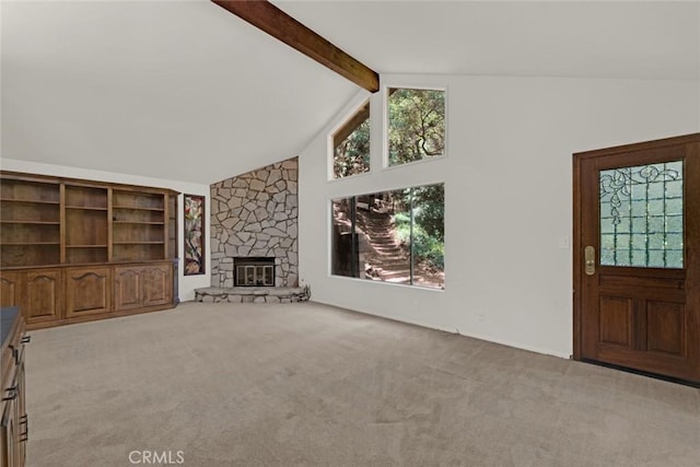 8402 Mcgroarty St, Sunland, CA 91040 - unfurnished living room with carpet flooring, beam ceiling, a fireplace, and high vaulted ceiling
