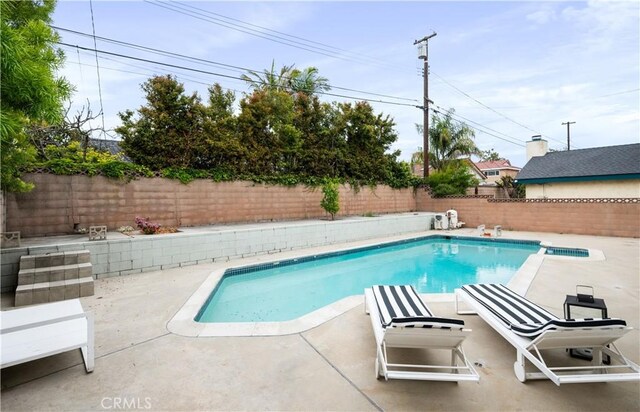 20619 Entradero Ave, Torrance, CA 90503 - view of swimming pool featuring a patio area and a fenced backyard