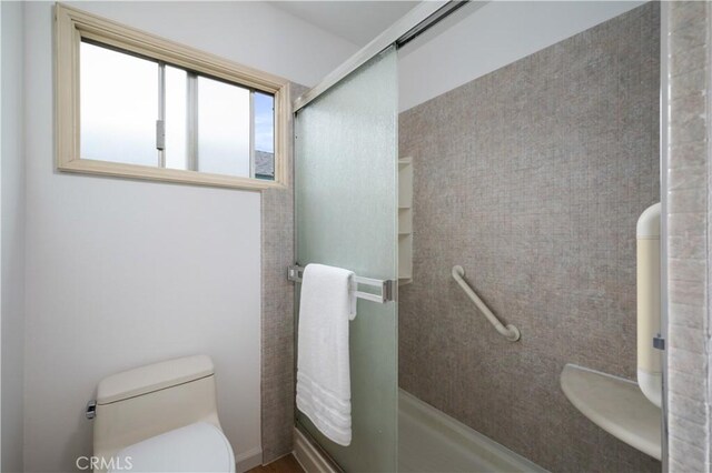 20619 Entradero Ave, Torrance, CA 90503 - bathroom featuring a shower with shower door and toilet