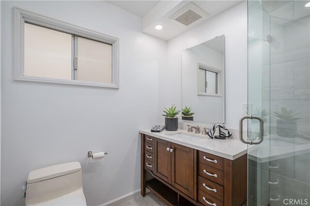 20619 Entradero Ave, Torrance, CA 90503 - full bath with toilet, a shower stall, vanity, and baseboards