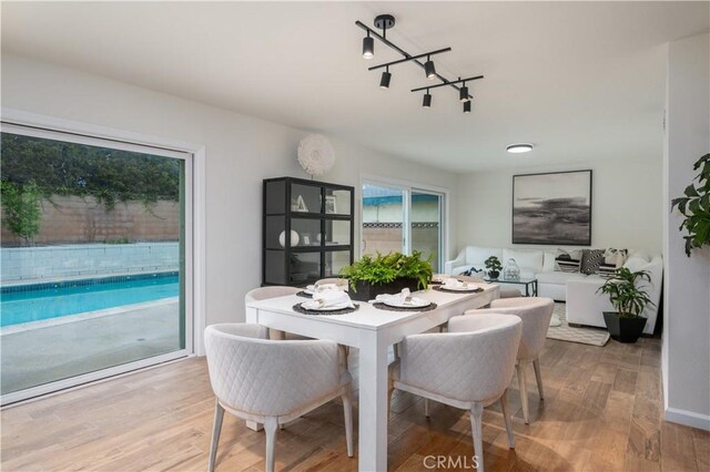 20619 Entradero Ave, Torrance, CA 90503 - dining room featuring wood finished floors and track lighting