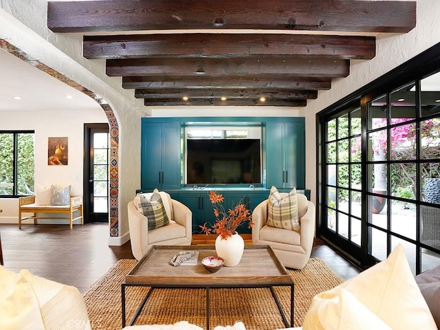 28021 Camino Santo Domingo, San Juan Capistrano, CA 92675 - living area featuring arched walkways, beamed ceiling, wood finished floors, and recessed lighting