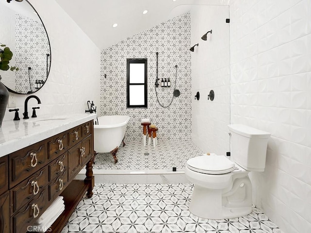 28021 Camino Santo Domingo, San Juan Capistrano, CA 92675 - bathroom featuring vaulted ceiling, a soaking tub, vanity, tile walls, and a tile shower