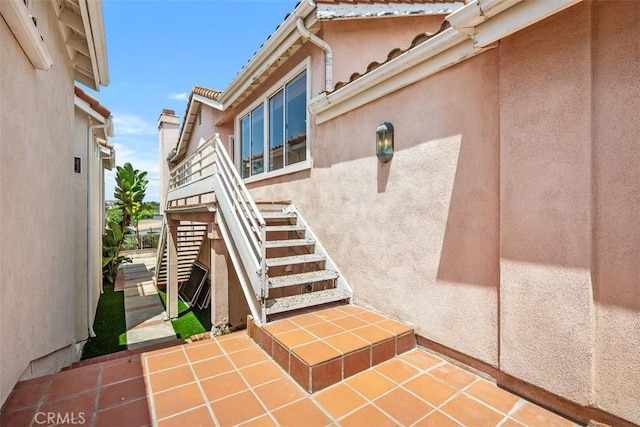 24851 Seagate Dr, Dana Point, CA 92629 - property entrance featuring stucco siding and a patio area