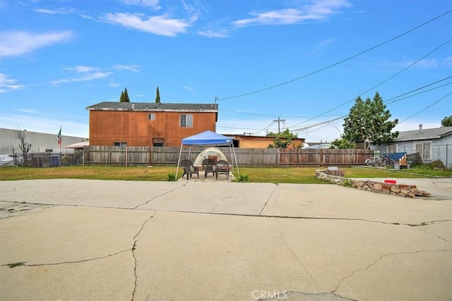 2368 E 107th St, Los Angeles, CA 90002 - rear view of property featuring a patio area and a gazebo