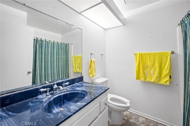 6145 Jasper St, Rancho Cucamonga, CA 91701 - bathroom featuring vanity, toilet, baseboards, and a shower with curtain