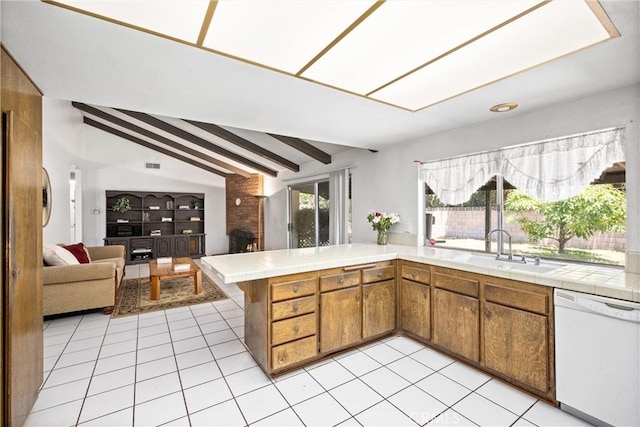 6145 Jasper St, Rancho Cucamonga, CA 91701 - kitchen with white dishwasher, a sink, brown cabinetry, tile countertops, and a peninsula
