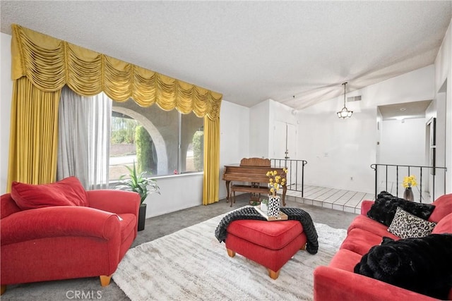6145 Jasper St, Rancho Cucamonga, CA 91701 - carpeted living room featuring vaulted ceiling and a textured ceiling