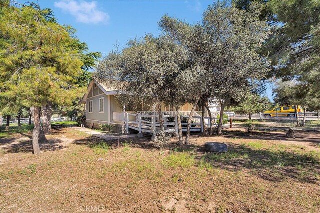 5635 Honeyhill Rd Unit A & B, Oak Hills, CA 92344 - view of yard featuring a deck