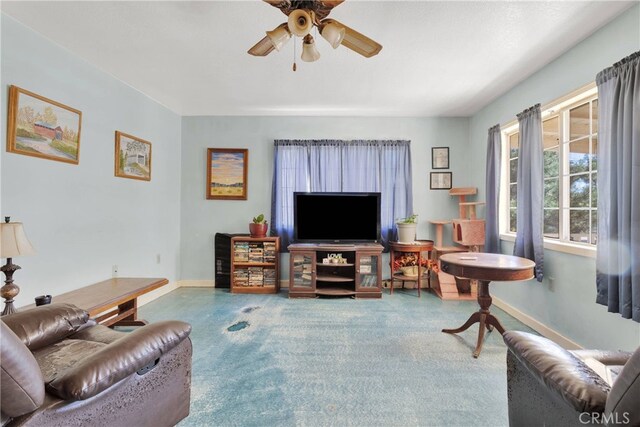 5635 Honeyhill Rd Unit A & B, Oak Hills, CA 92344 - carpeted living room with ceiling fan and baseboards