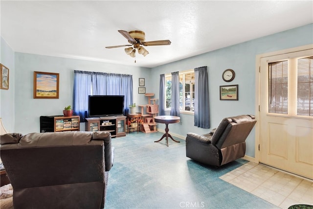 5635 Honeyhill Rd Unit A & B, Oak Hills, CA 92344 - living area with a ceiling fan and baseboards