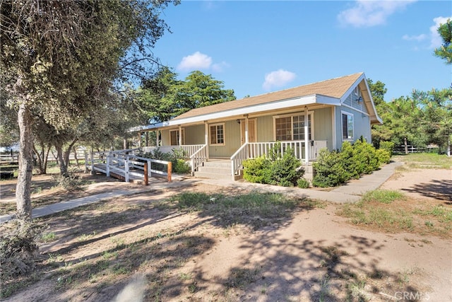 5635 Honeyhill Rd Unit A & B, Oak Hills, CA 92344 - view of front of home featuring covered porch
