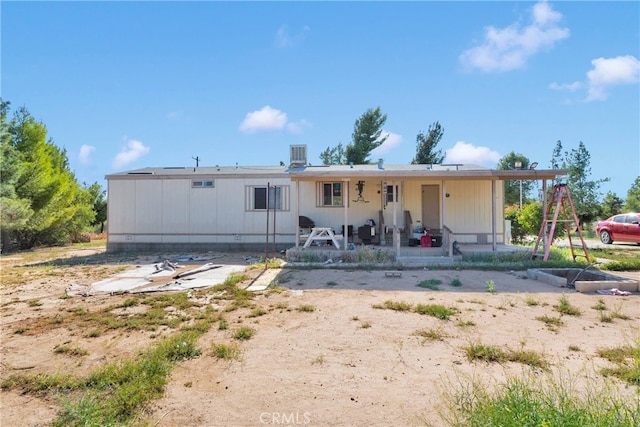 5635 Honeyhill Rd Unit A & B, Oak Hills, CA 92344 - back of house with a patio area