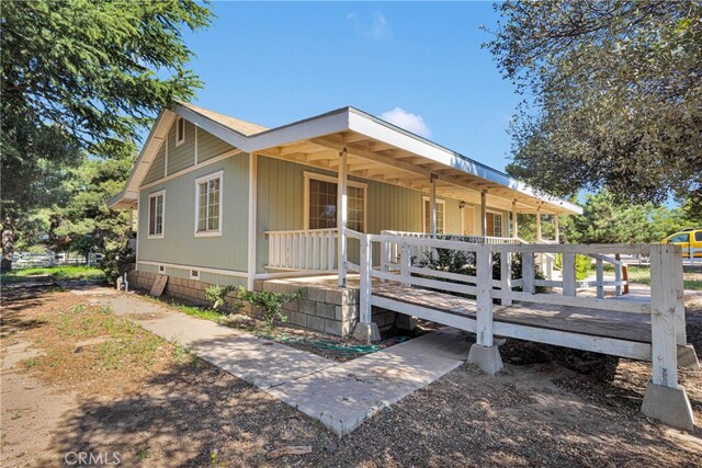 5635 Honeyhill Rd Unit A & B, Oak Hills, CA 92344 - view of front of property featuring covered porch and crawl space