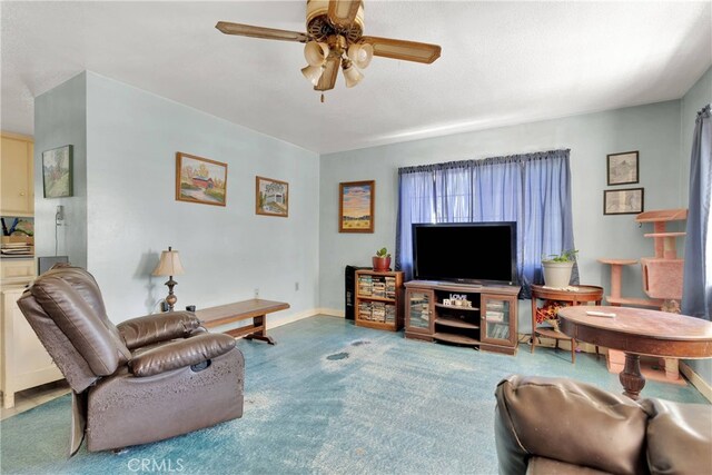 5635 Honeyhill Rd Unit A & B, Oak Hills, CA 92344 - living room featuring a ceiling fan and carpet flooring