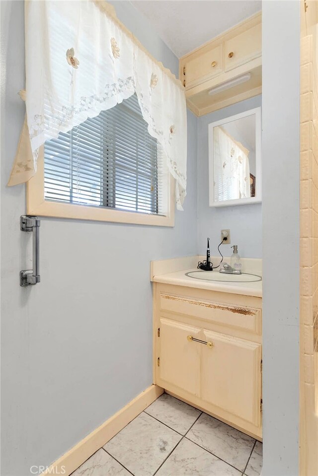 5635 Honeyhill Rd Unit A & B, Oak Hills, CA 92344 - bathroom featuring vanity and tile patterned floors