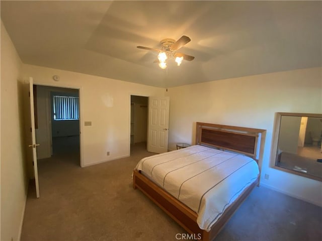 1585 Gate Ln, Paradise, CA 95969 - carpeted bedroom featuring baseboards, ceiling fan, and a walk in closet