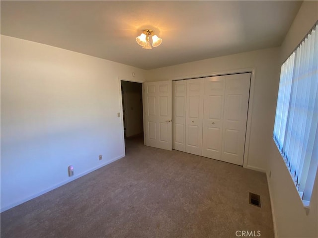 1585 Gate Ln, Paradise, CA 95969 - unfurnished bedroom featuring carpet flooring, baseboards, and a closet