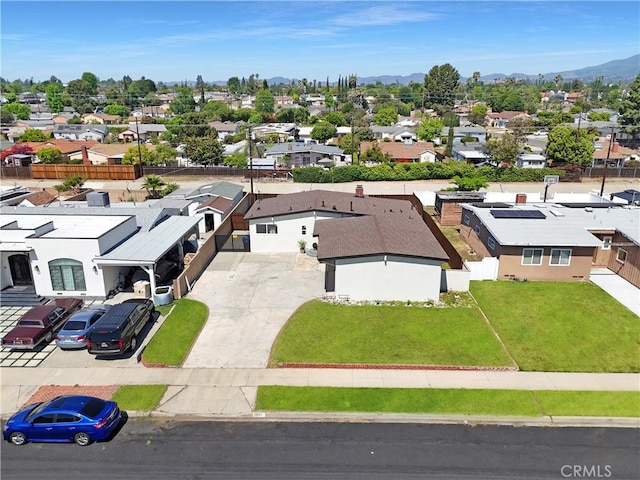 9809 Odessa Ave, North Hills, CA 91343 - aerial perspective of suburban area with a mountainous background