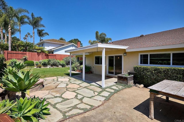 723 Fresca Ct, Solana Beach, CA 92075 - back of house featuring stucco siding, a patio, and a shingled roof