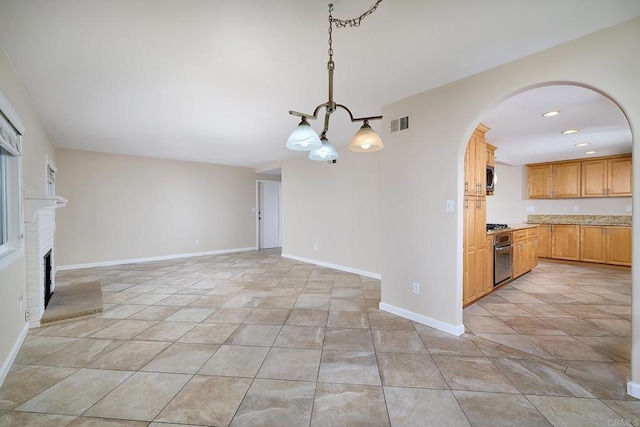 723 Fresca Ct, Solana Beach, CA 92075 - unfurnished living room with arched walkways, a fireplace, baseboards, and recessed lighting