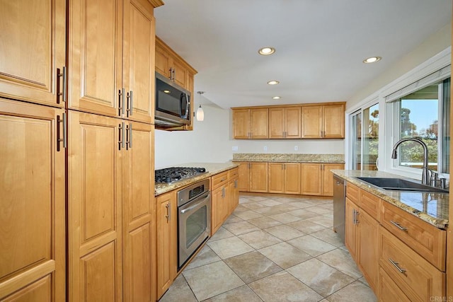 723 Fresca Ct, Solana Beach, CA 92075 - kitchen featuring stainless steel appliances, a sink, light stone countertops, recessed lighting, and light tile patterned floors