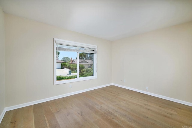 723 Fresca Ct, Solana Beach, CA 92075 - spare room featuring wood finished floors and baseboards