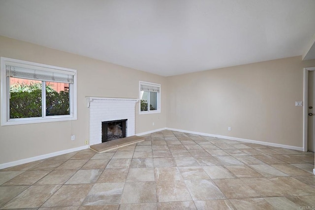 723 Fresca Ct, Solana Beach, CA 92075 - unfurnished living room featuring plenty of natural light, a fireplace, and baseboards