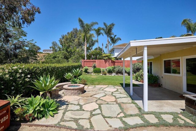 723 Fresca Ct, Solana Beach, CA 92075 - view of patio with an outdoor fire pit