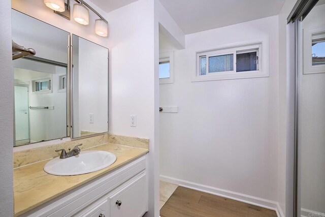 723 Fresca Ct, Solana Beach, CA 92075 - bathroom featuring vanity and wood finished floors