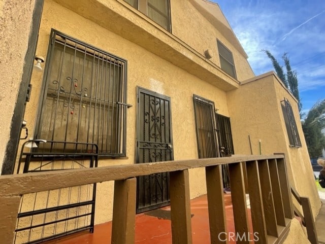 1835 W 12th St, Los Angeles, CA 90006 - view of side of home with stucco siding