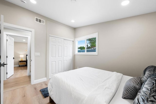 13824 Powers Rd, Poway, CA 92064 - bedroom featuring light wood-type flooring, recessed lighting, a closet, and baseboards