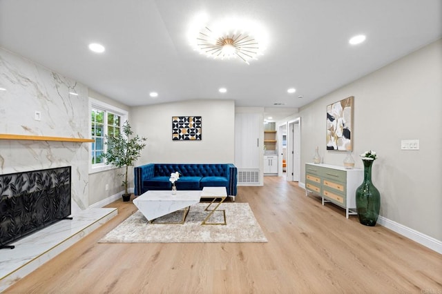 13824 Powers Rd, Poway, CA 92064 - living room with recessed lighting, wood finished floors, baseboards, and a premium fireplace