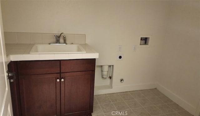 10372 Christo Way, Elk Grove, CA 95757 - washroom featuring hookup for an electric dryer, hookup for a washing machine, baseboards, hookup for a gas dryer, and cabinet space