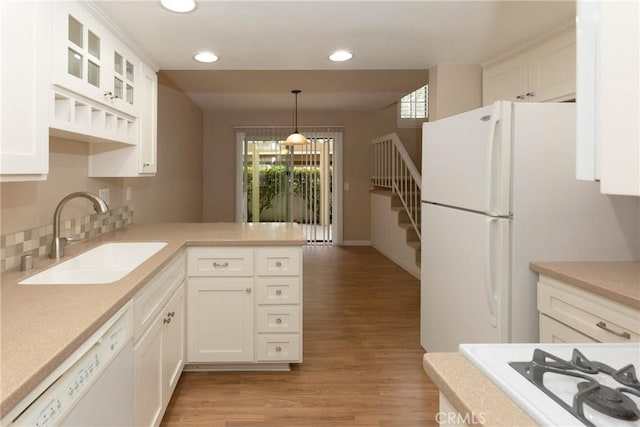 2150 Cheyenne Way Unit 165, Fullerton, CA 92833 - kitchen with a sink, white appliances, light wood finished floors, recessed lighting, and white cabinetry