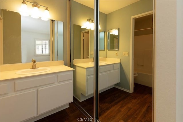 2150 Cheyenne Way Unit 165, Fullerton, CA 92833 - bathroom with wood finished floors, vanity, and toilet