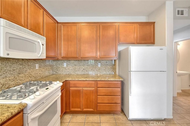 1080 Athens Way, Upland, CA 91786 - kitchen featuring white appliances, light tile patterned flooring, backsplash, and light stone counters