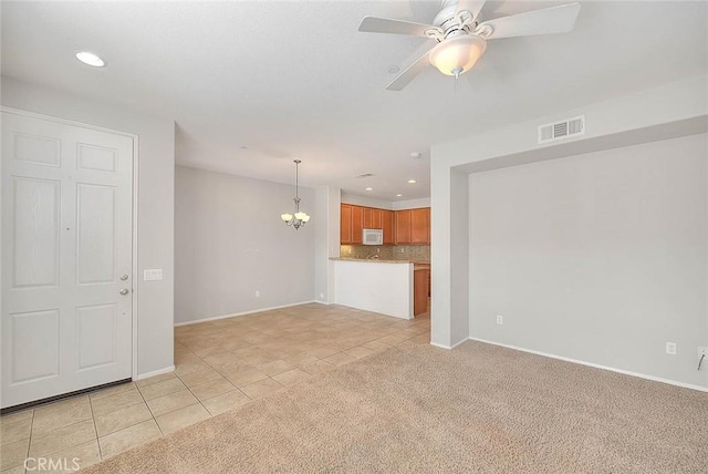 1080 Athens Way, Upland, CA 91786 - unfurnished living room featuring light tile patterned floors, baseboards, a chandelier, ceiling fan, and recessed lighting