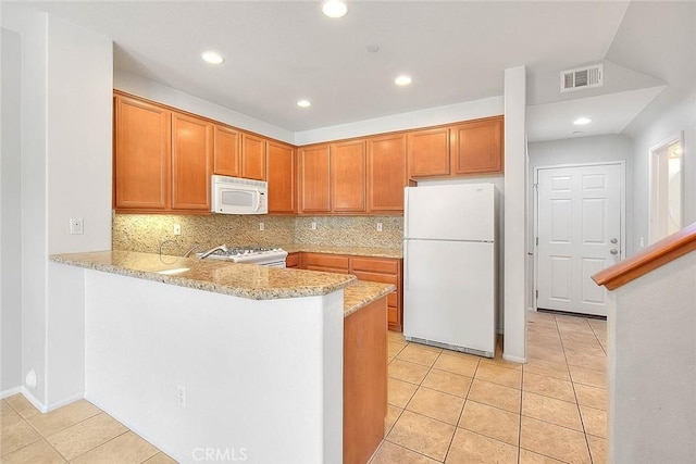 1080 Athens Way, Upland, CA 91786 - kitchen featuring white appliances, light tile patterned floors, decorative backsplash, light stone counters, and recessed lighting