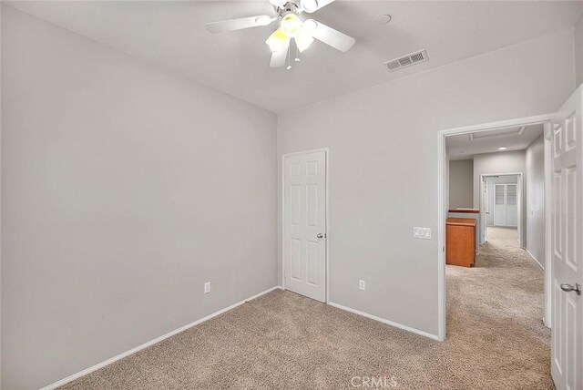 1080 Athens Way, Upland, CA 91786 - unfurnished room featuring light colored carpet, a ceiling fan, and baseboards