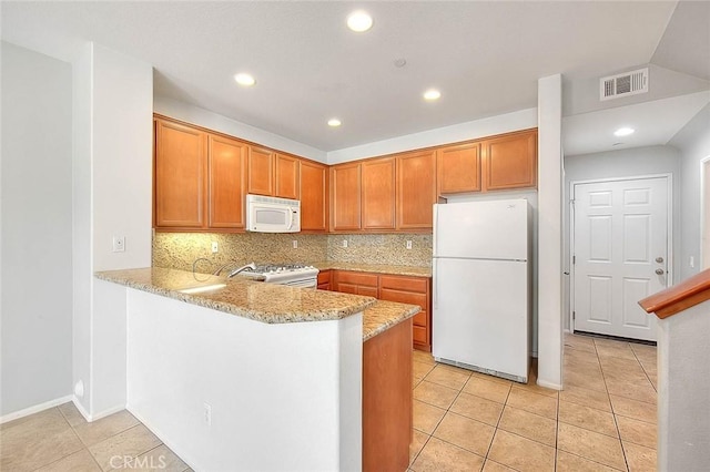 1080 Athens Way, Upland, CA 91786 - kitchen featuring white appliances, light tile patterned floors, backsplash, light stone counters, and recessed lighting