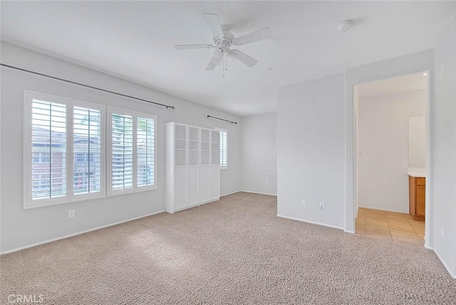 1080 Athens Way, Upland, CA 91786 - empty room with light colored carpet, a ceiling fan, baseboards, and a smoke detector