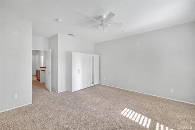1080 Athens Way, Upland, CA 91786 - unfurnished bedroom with carpet flooring, a closet, baseboards, and a ceiling fan